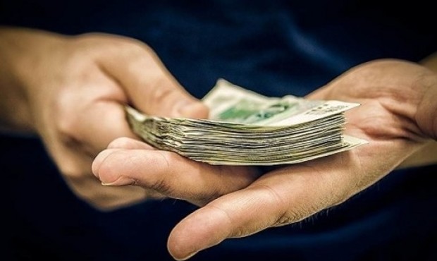 На хабарі у 100 тисяч гривень викрили арбітражного керуючого та ліцитатора